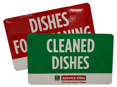 A red and green sign that says dishes for cleaned dishes