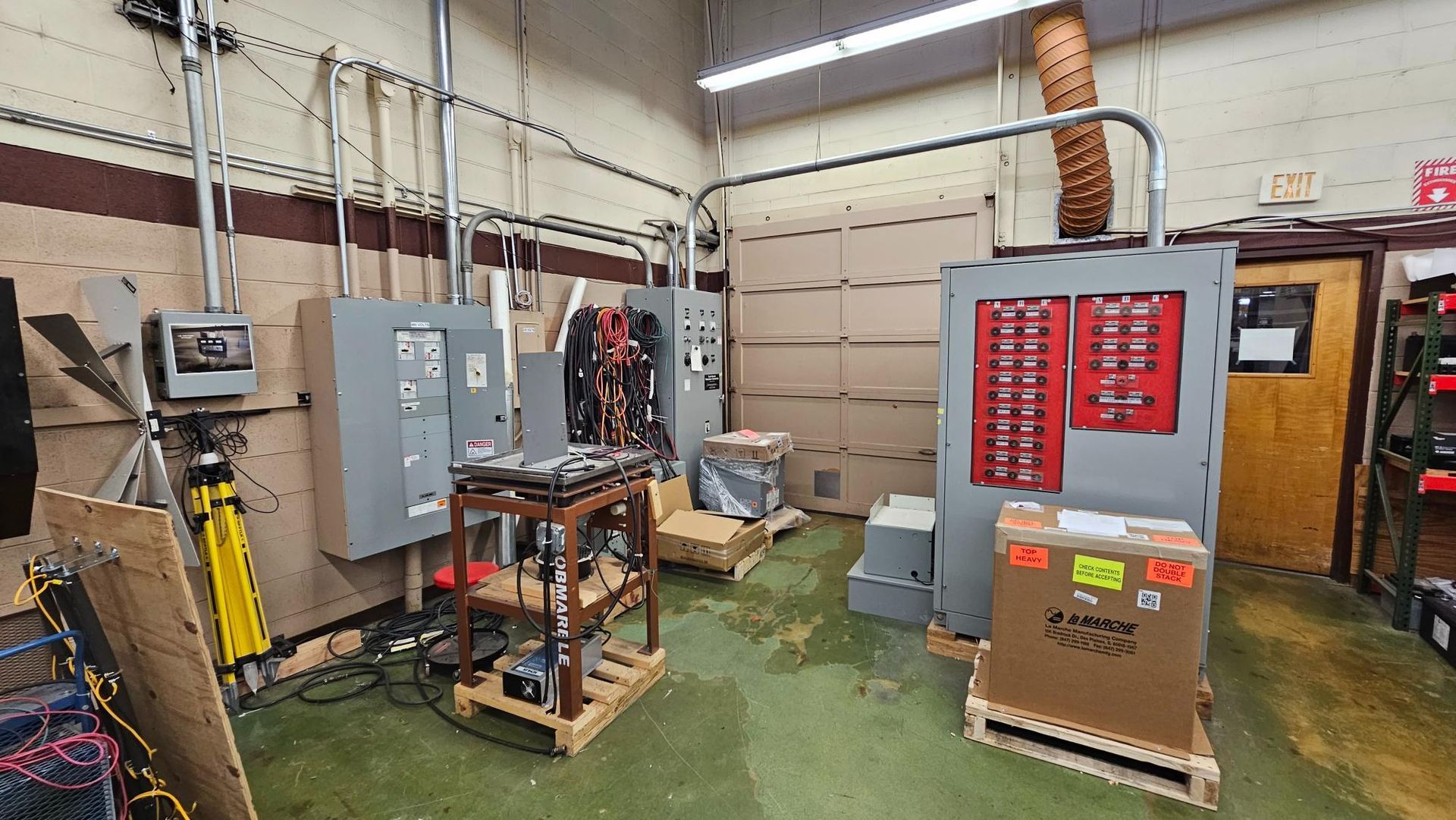 A room with a lot of electrical equipment in it