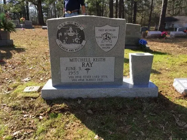A Gravestone in a Cemetery for Mitchell Ray – Canton, MS – Davidson Marble & Granite