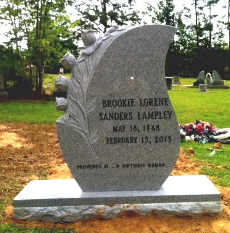 A Gravestone in a Cemetery for Brookie Lorene Sanders Lampley – Canton, MS – Davidson Marble & Granite