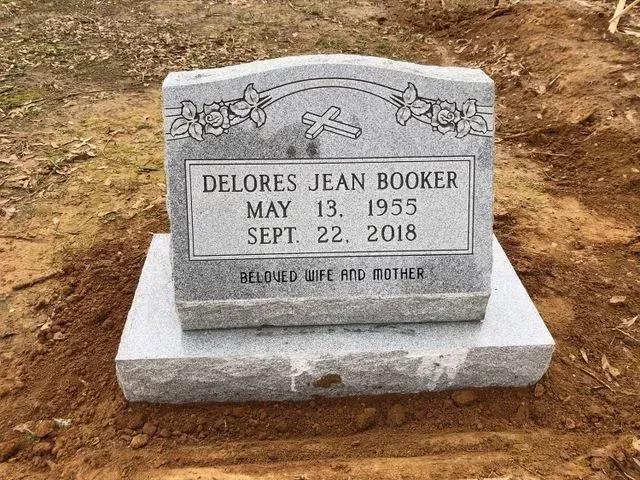 A Gravestone for Delores Jean Booker is in a Graveyard – Canton, MS – Davidson Marble & Granite