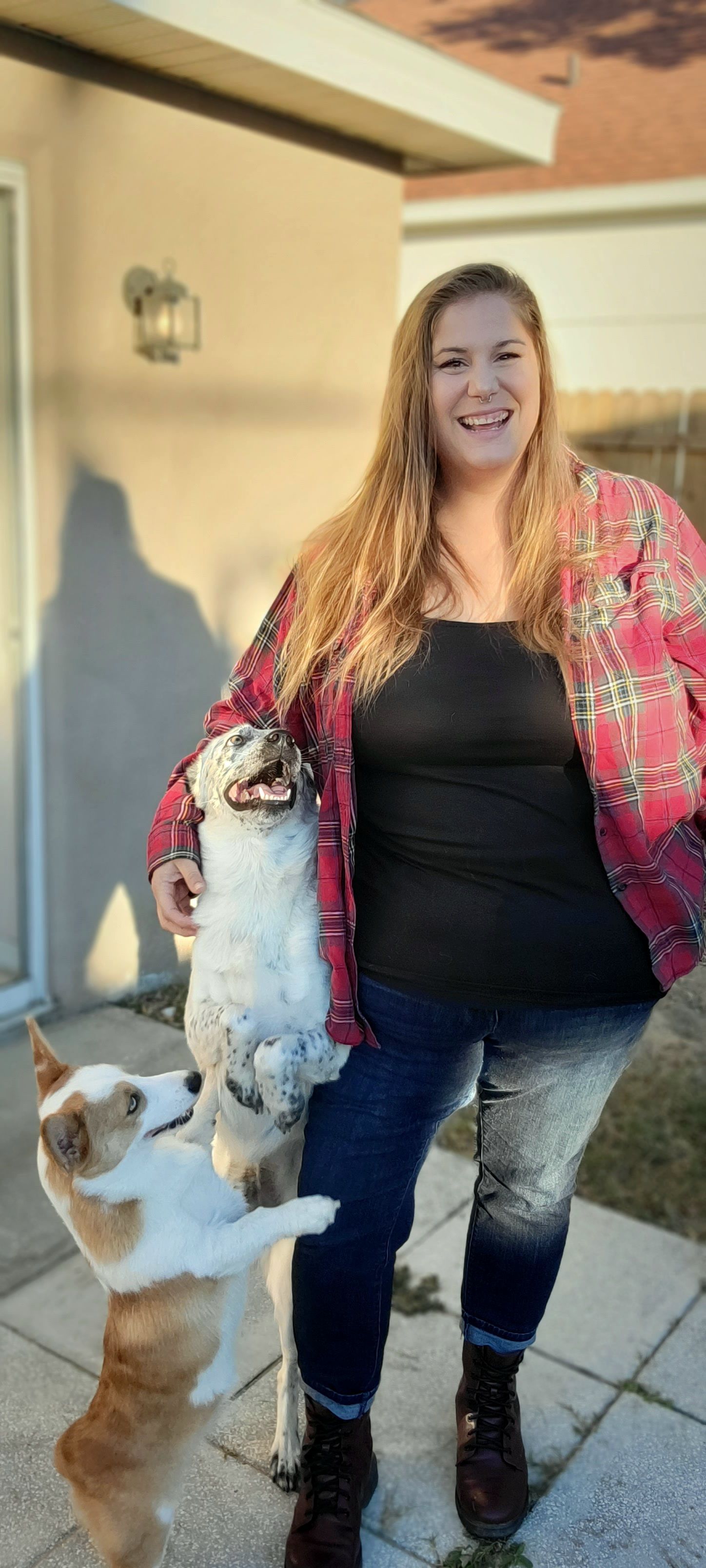 Trainor Standing beside the Two Dogs — Clermont, FL — Buena Vista Dog Training