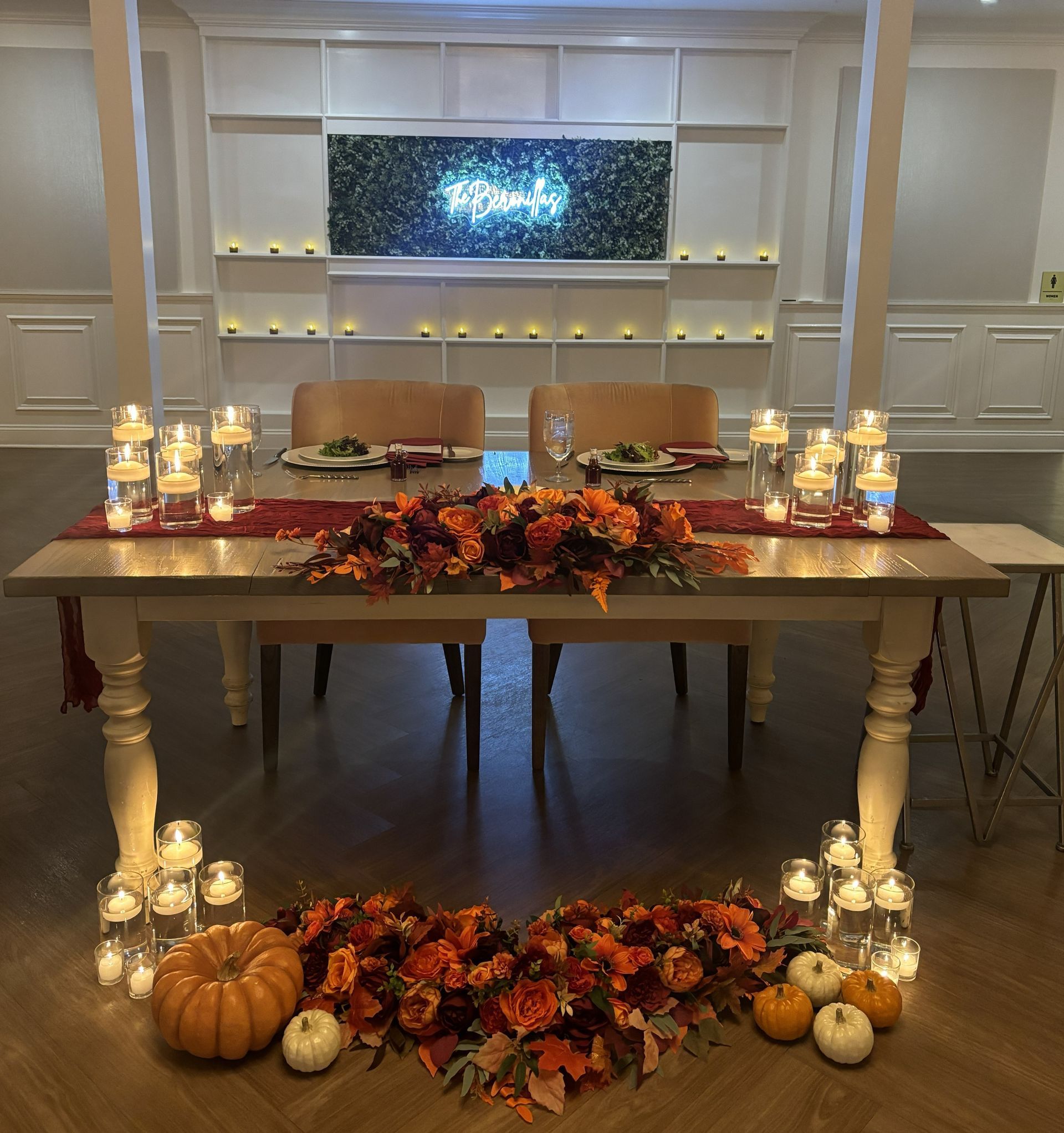 Bear Brook Valley Wedding Sweetheart Table with Repurposed Arch Florals