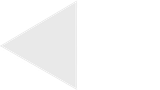 A white triangle with a shadow on a white background.