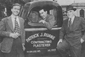 Three men are standing next to a truck that says patrick j. ruane contracting plasterer.
