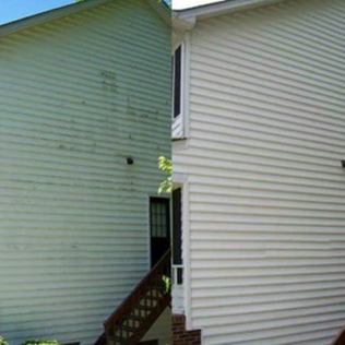 Side-by-side comparison of a house exterior: dirty green siding on the left, clean white siding on the right.