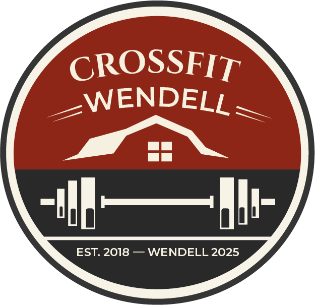 Circular logo: barn silhouette over barbell, red and black background. "Est. 2018 - Wendell 2025" text.