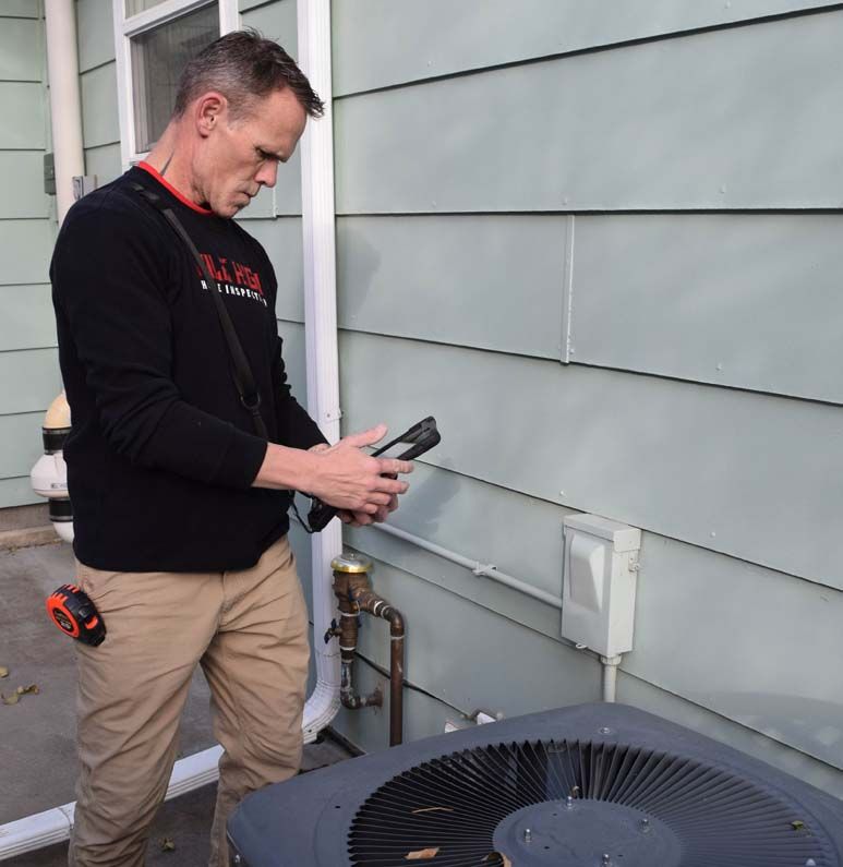 A man wearing a black shirt that says ' o'neill ' on it