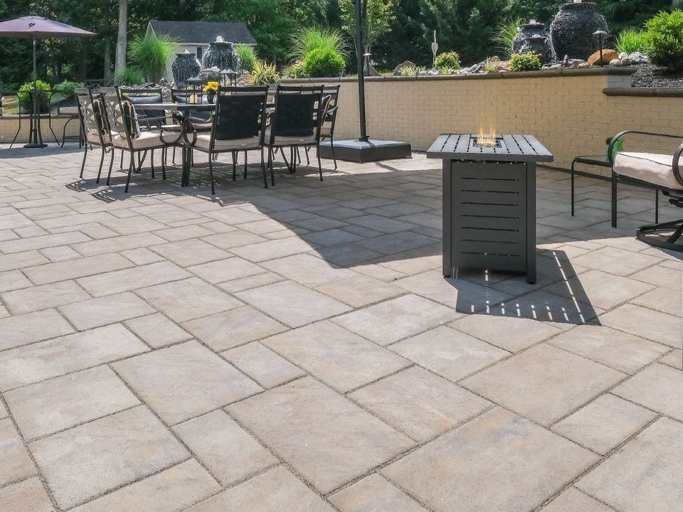 Paver patio completed by Bayside Outdoor Living in Maryland, showcasing durable stonework and clean design.