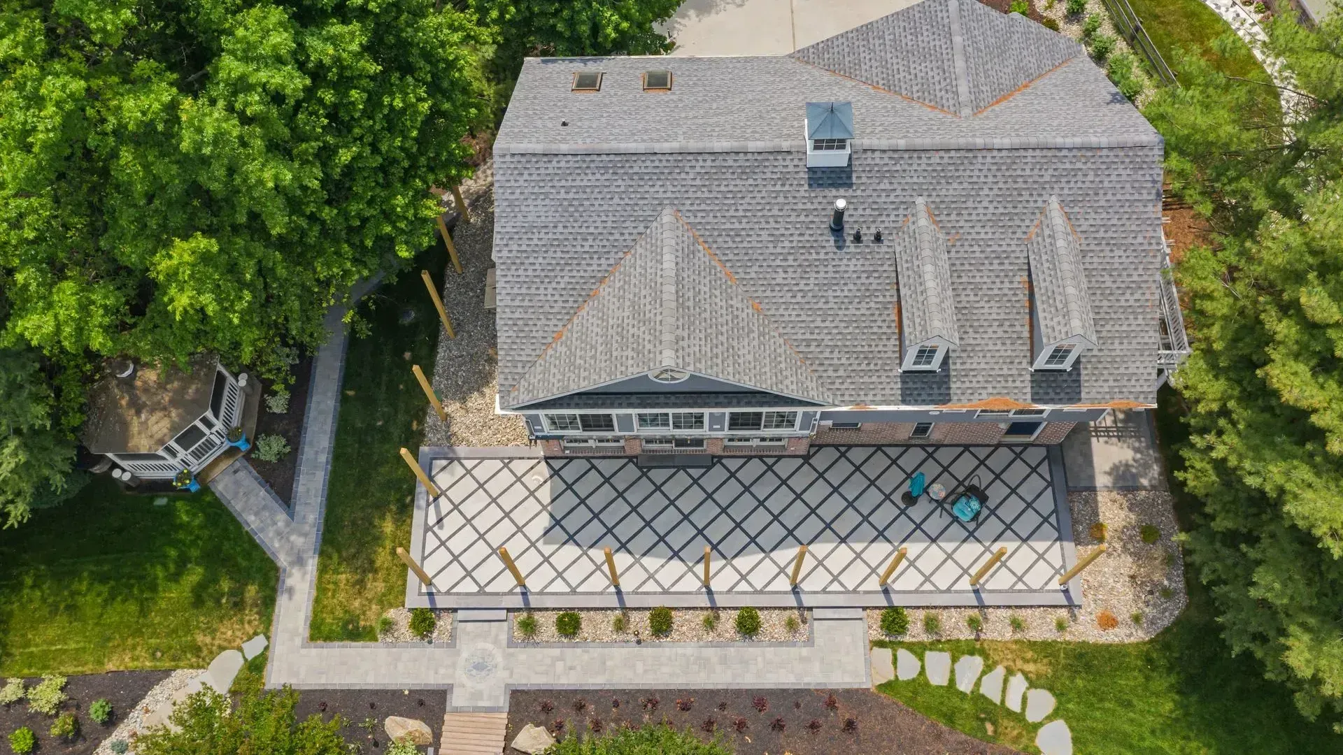 Overhead view of a custom patio and walkway designed by Bayside Outdoor Living