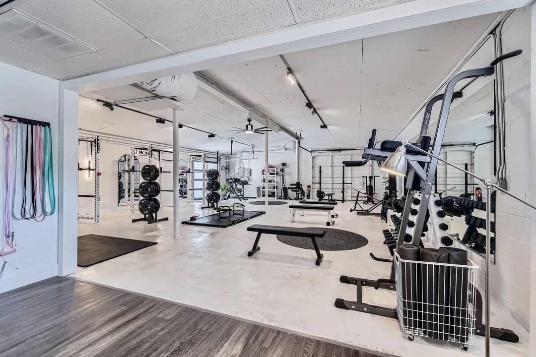 A gym with a lot of exercise equipment for women's gym
