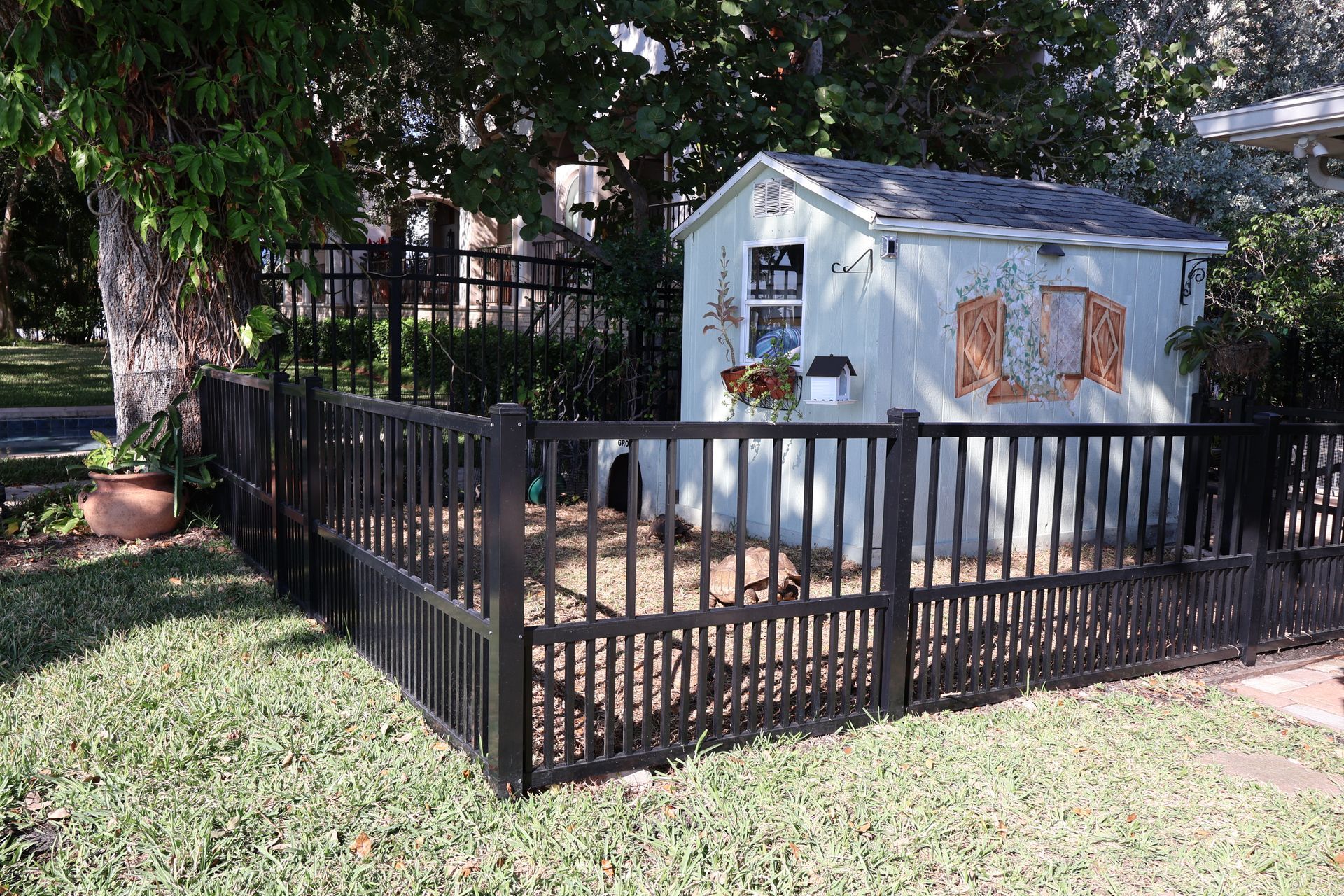 Residential aluminum/ornamental fence installation in Tampa, FL