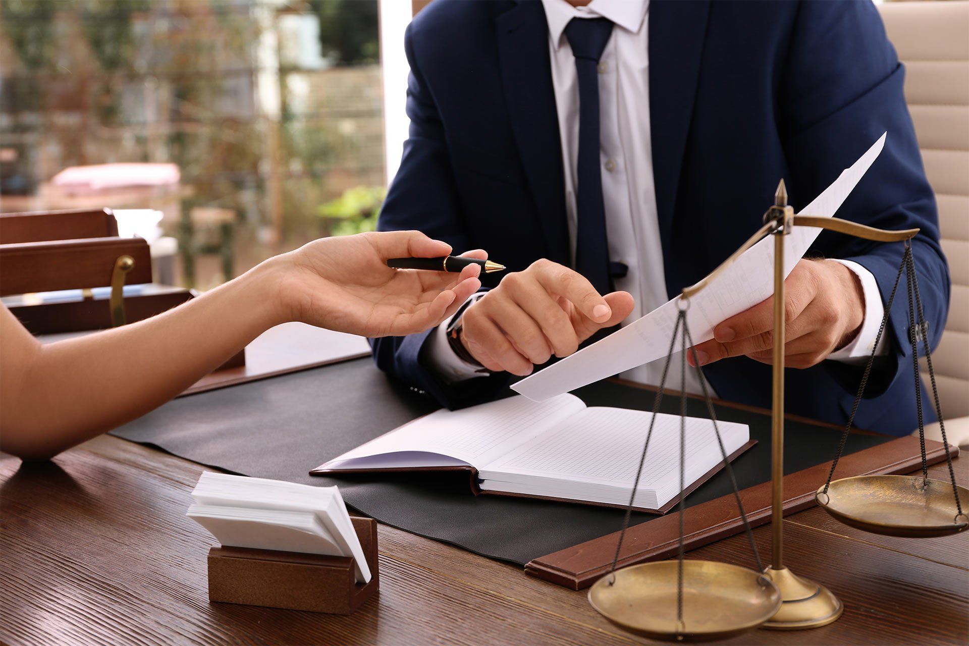 lawyer talking to his assistant