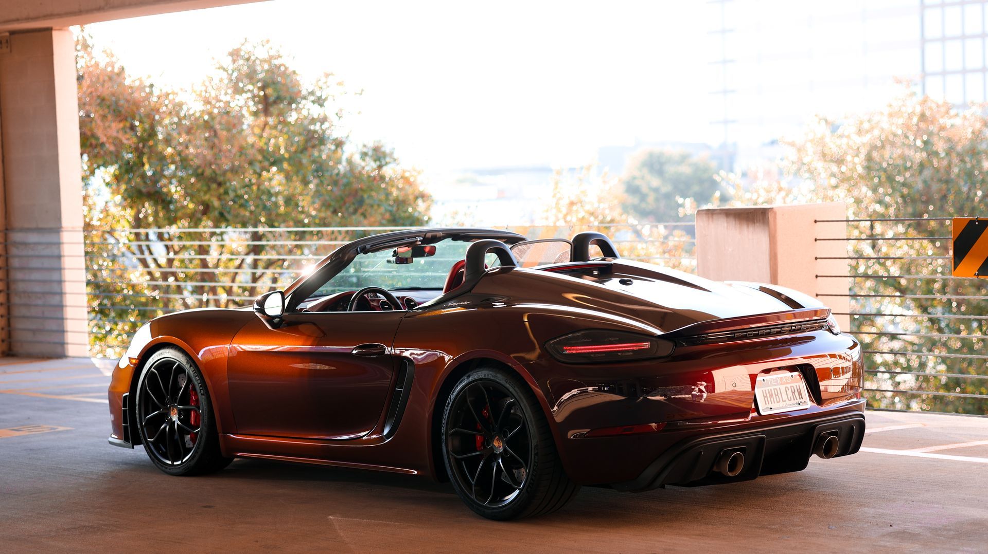 oh sheeeeeeesh. That's Ultrafit Phoenix Red PPF on that Porsche 718 Spyder.