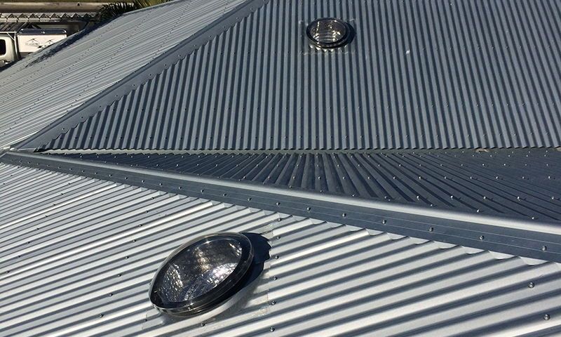 Custom orb profile zincalume skylights installed in re-roof