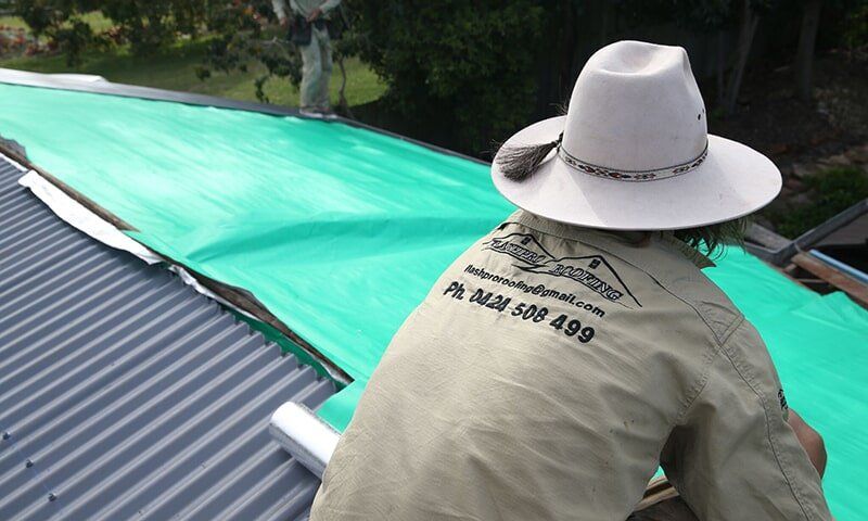 Flashpro roofer installing heavy duty sarking