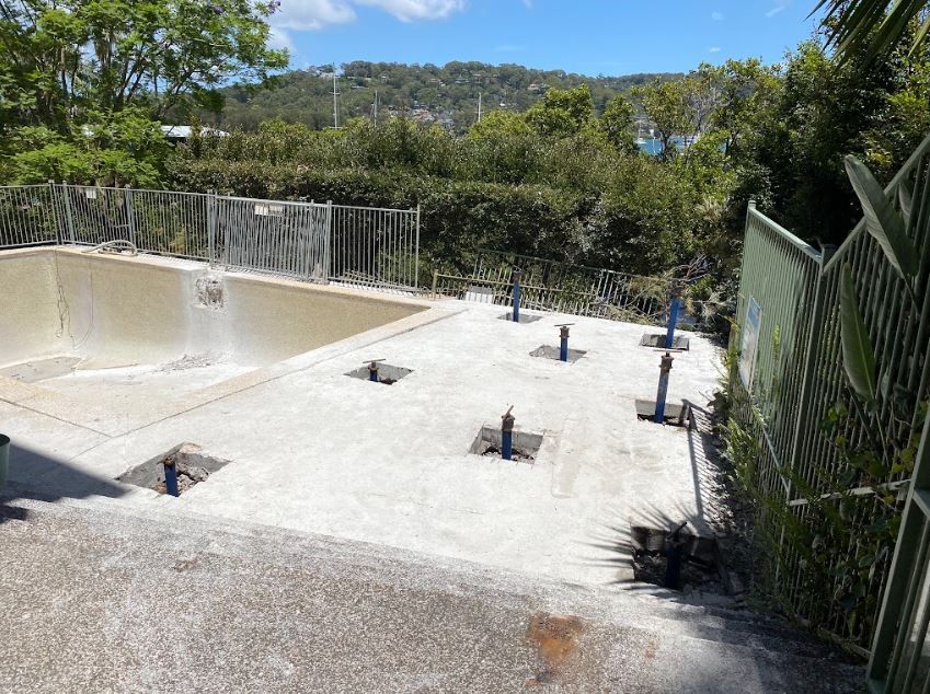 screw piles installed in a backyard