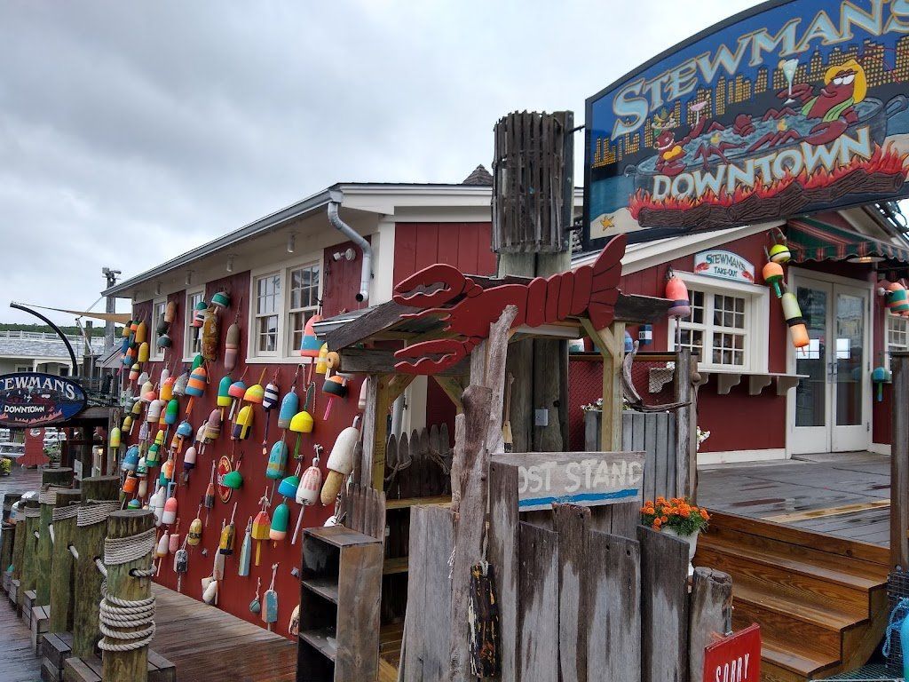 A red building with a sign that says stewmans downtown on it.
