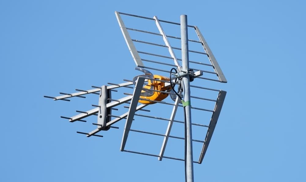 An Antenna On A Pole With A Blue Sky In The Background — Coastwide Antennas In Ourimbah, NSW