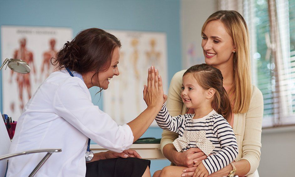 Doctor with Patient - Pediatric Neurology in Tampa, FL