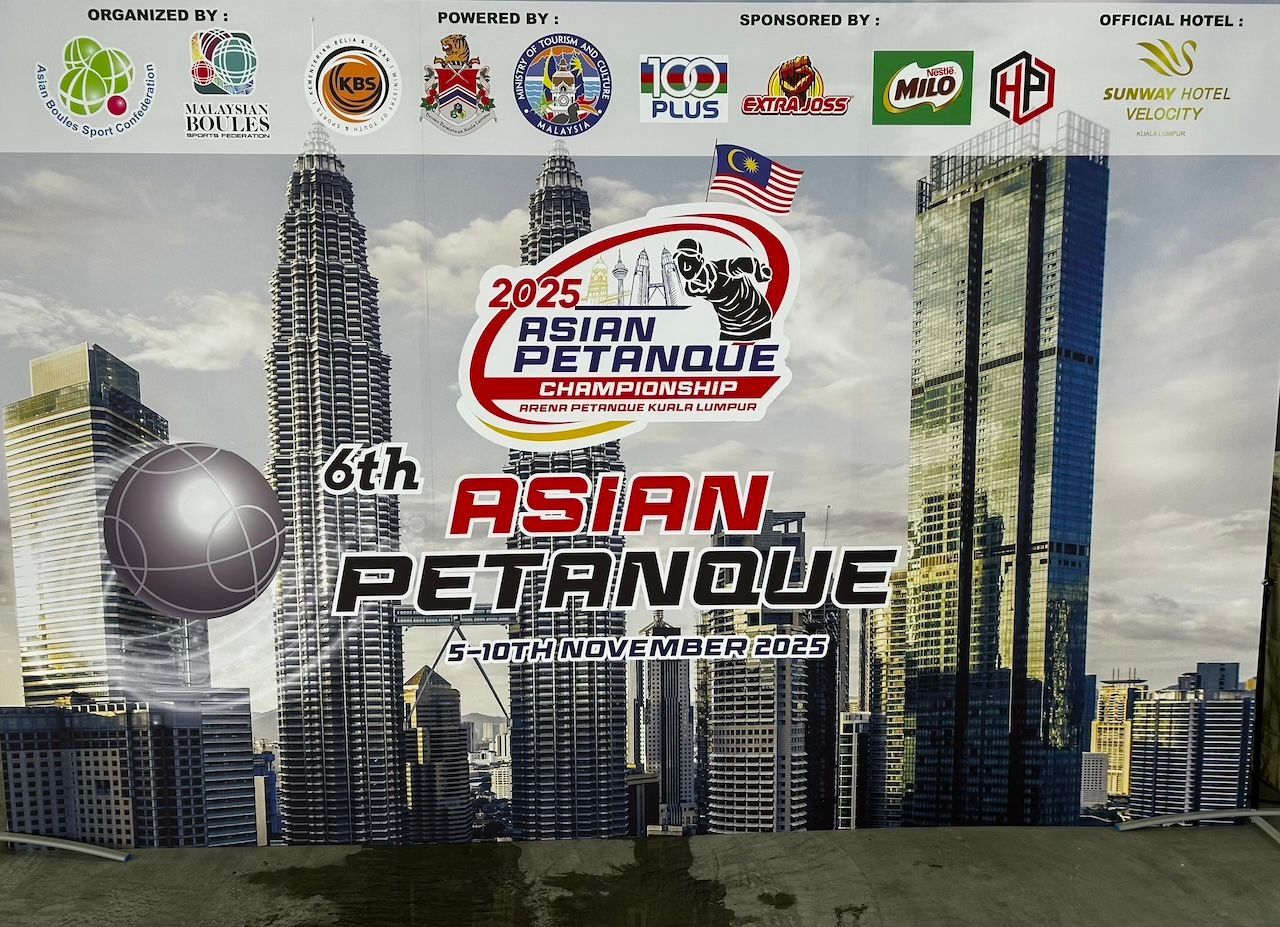 Poster for the 6th Asian Petanque Championship, featuring Kuala Lumpur skyline and event logos.