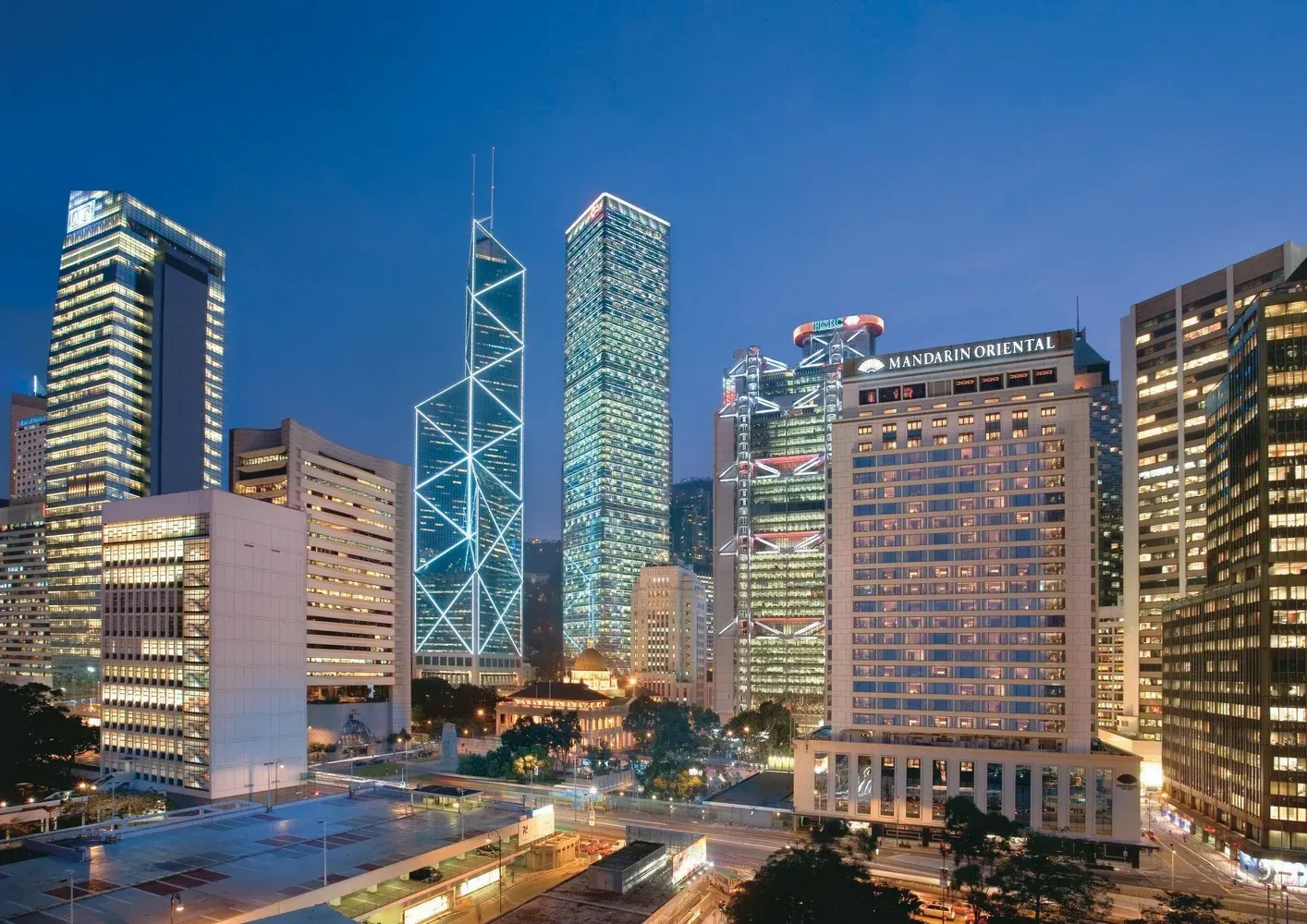 Night view of Hong Kong skyline with illuminated skyscrapers. The_Mandarin_Oriental_Hong Kong_