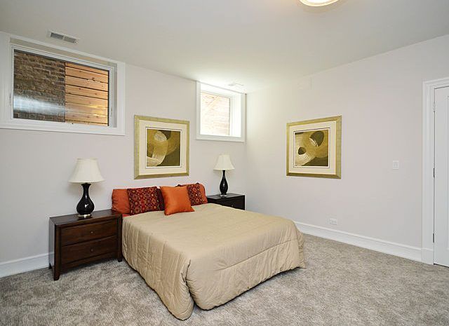 Bedroom with large bed and nighstands