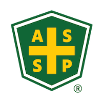 A green shield with a yellow cross inside of it.