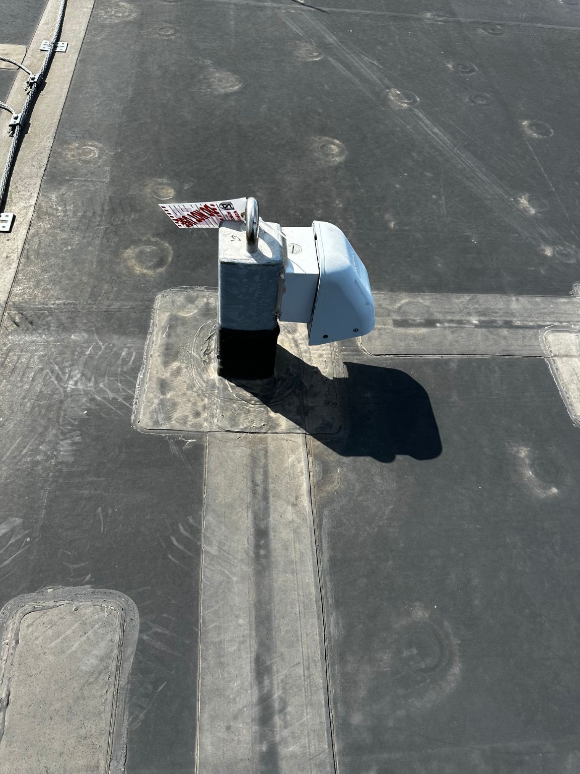 An aerial view of a roof with a light on it