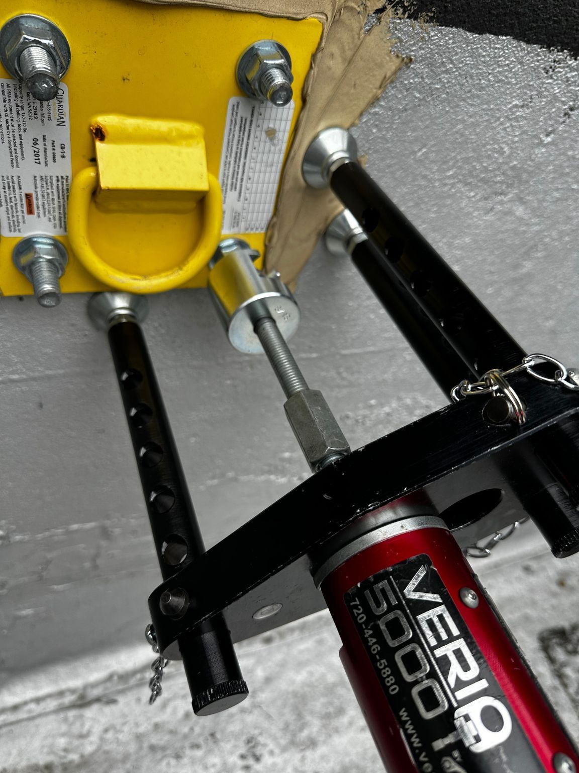 A red and black device that says vertigo on it