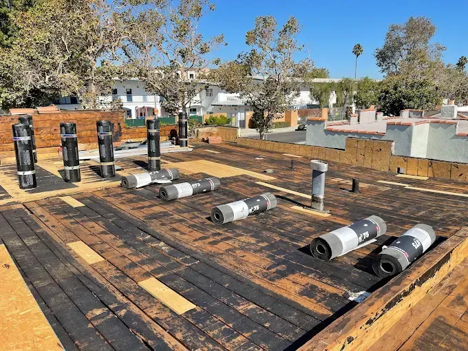 Flat roof replacement in Norwalk showing the benefits of torch-down roofing installation