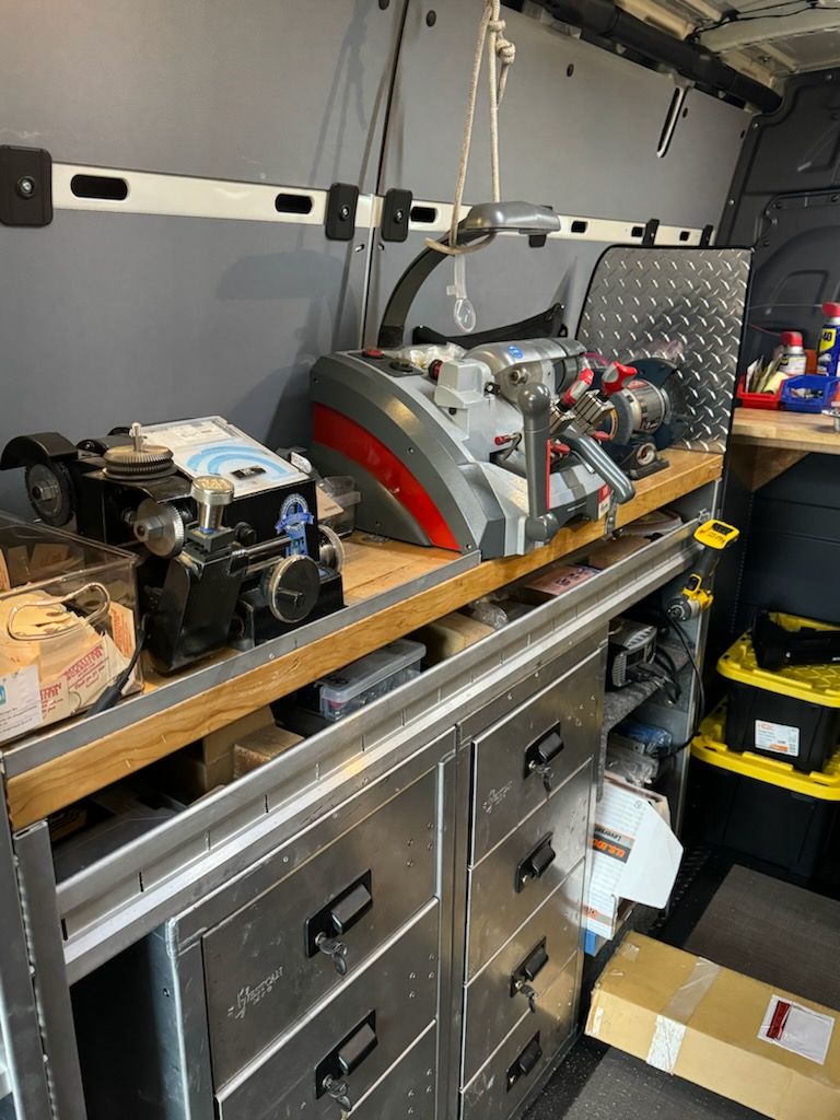 a van is filled with lots of tools and equipment .