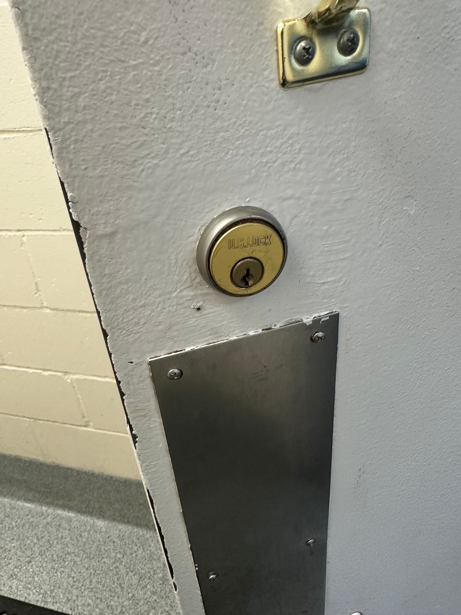 a lock repaired on a warehouse door.