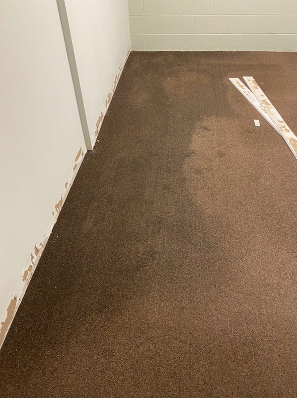 A floor that has been water damaged.