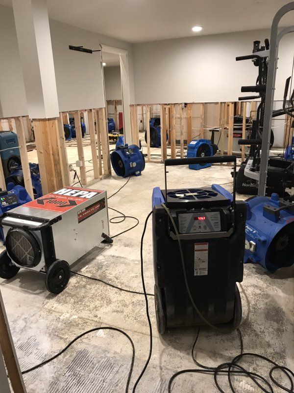 A room with a lot of electrical equipment in it.