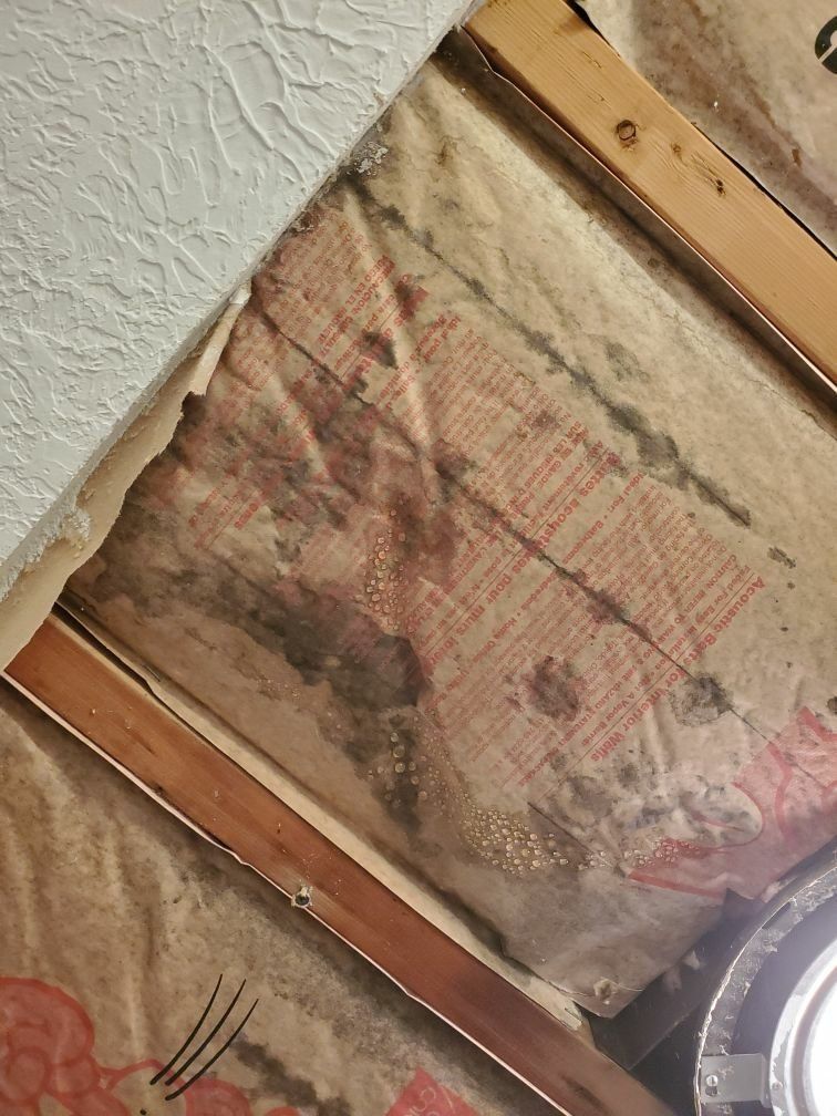 A close up of a piece of insulation on a wall.