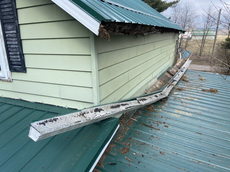 Gutter system of the house is bent around the corner.