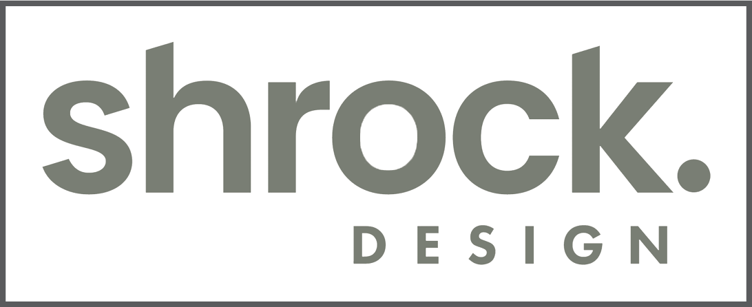 The logo for shrock design is gray and white