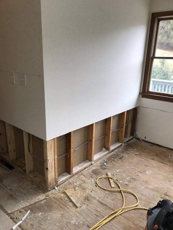 A water damaged room being repaired.