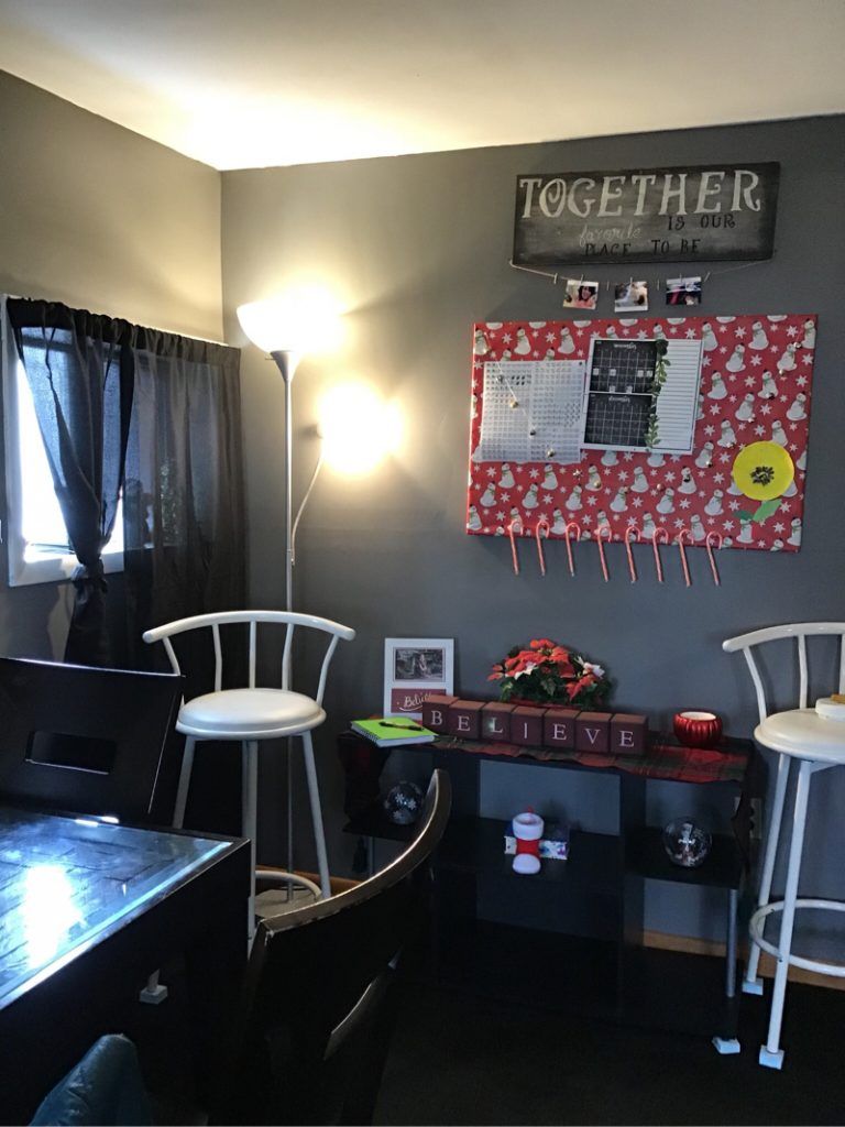 There is a sign on the wall that says `` together ''.