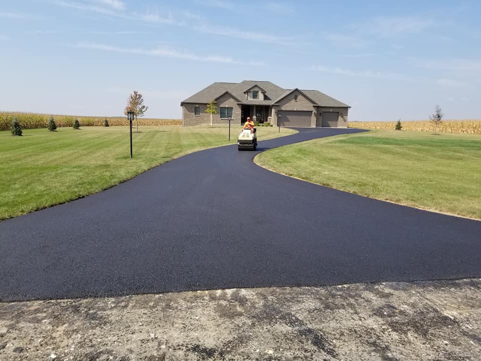 Workers Placing New Coating of Asphalt on the Road — West Manchester, OH — Back 2 Black Asphalt