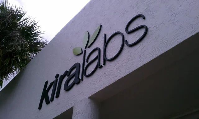 A white building with the word kiralabs on it