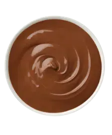 Chocolate pudding in a white bowl, swirled texture, brown color.