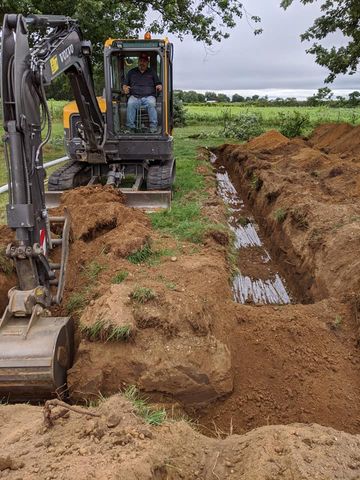 Excavator preparing site — White Pigeon, MI — Mercers Septic & Excavating LLC