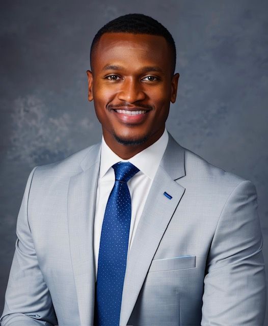 Silhouette of a person inside a grey circle.