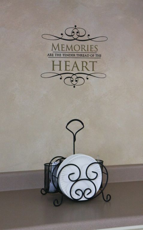 Plates and quote on wall that reads