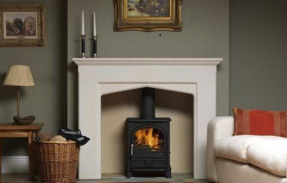 Wood burning stove in fireplace