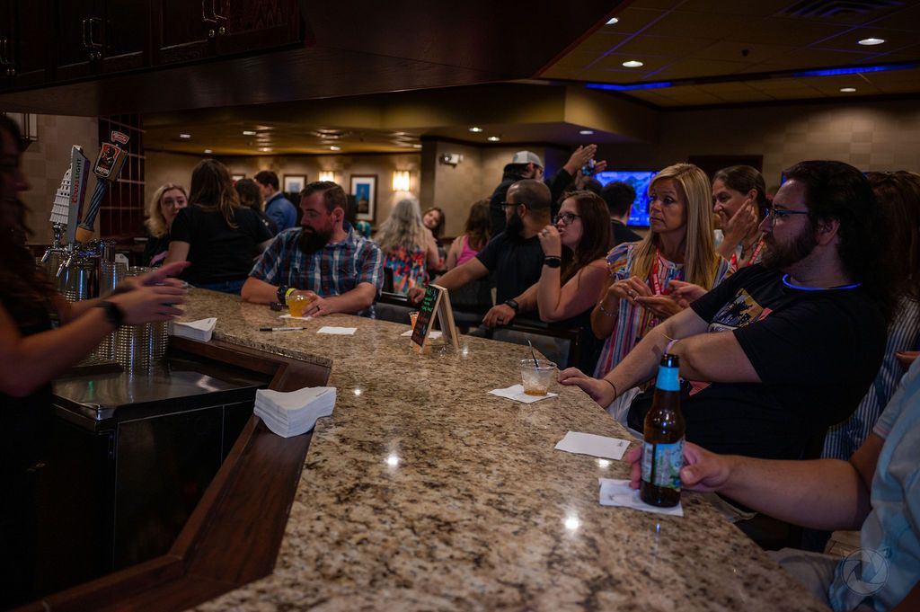 people gathered at the after party for the 2022 Capital City Comic Con event