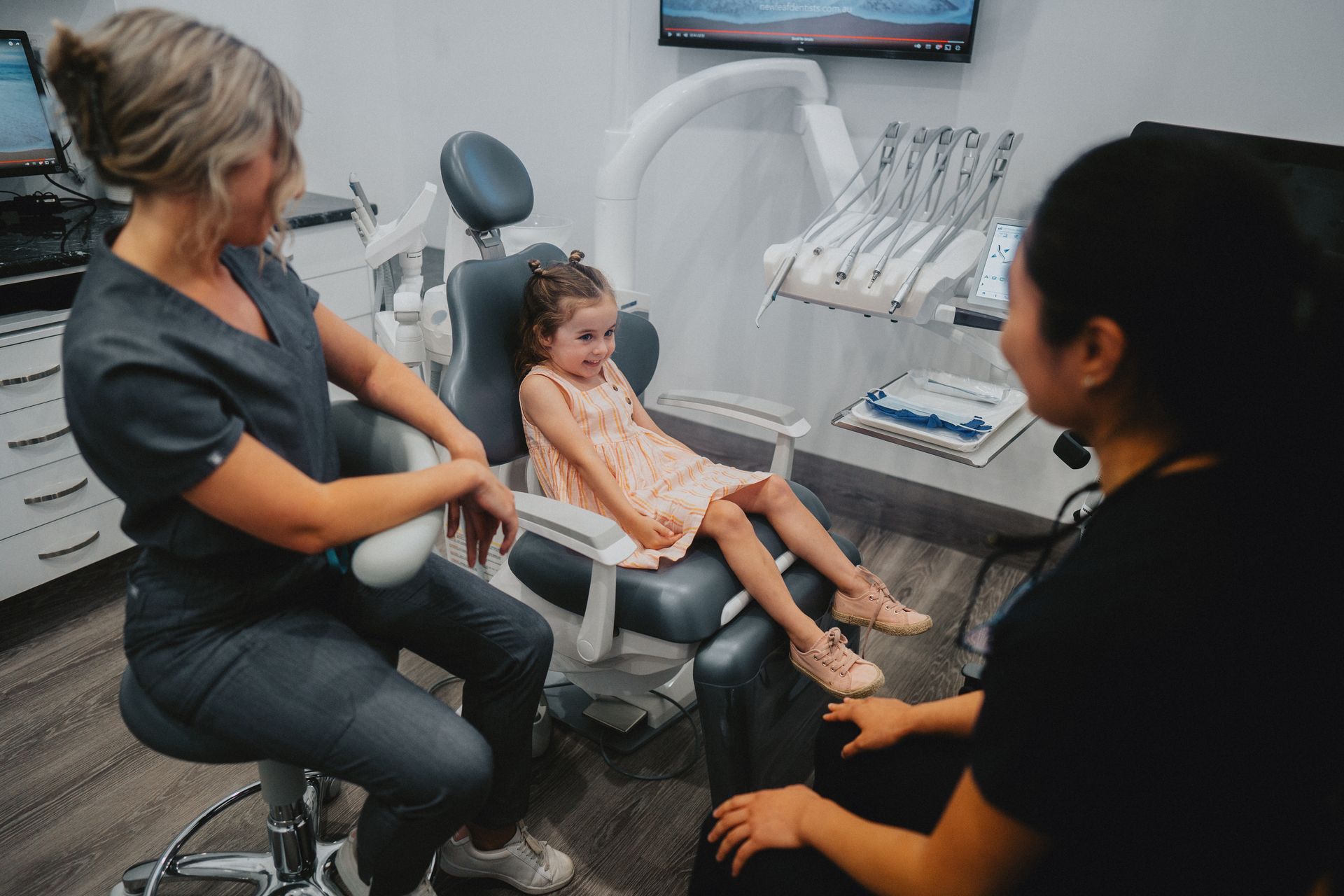 Young Girl Smiles at Dentist — New Leaf Dentists In Erina, NSW