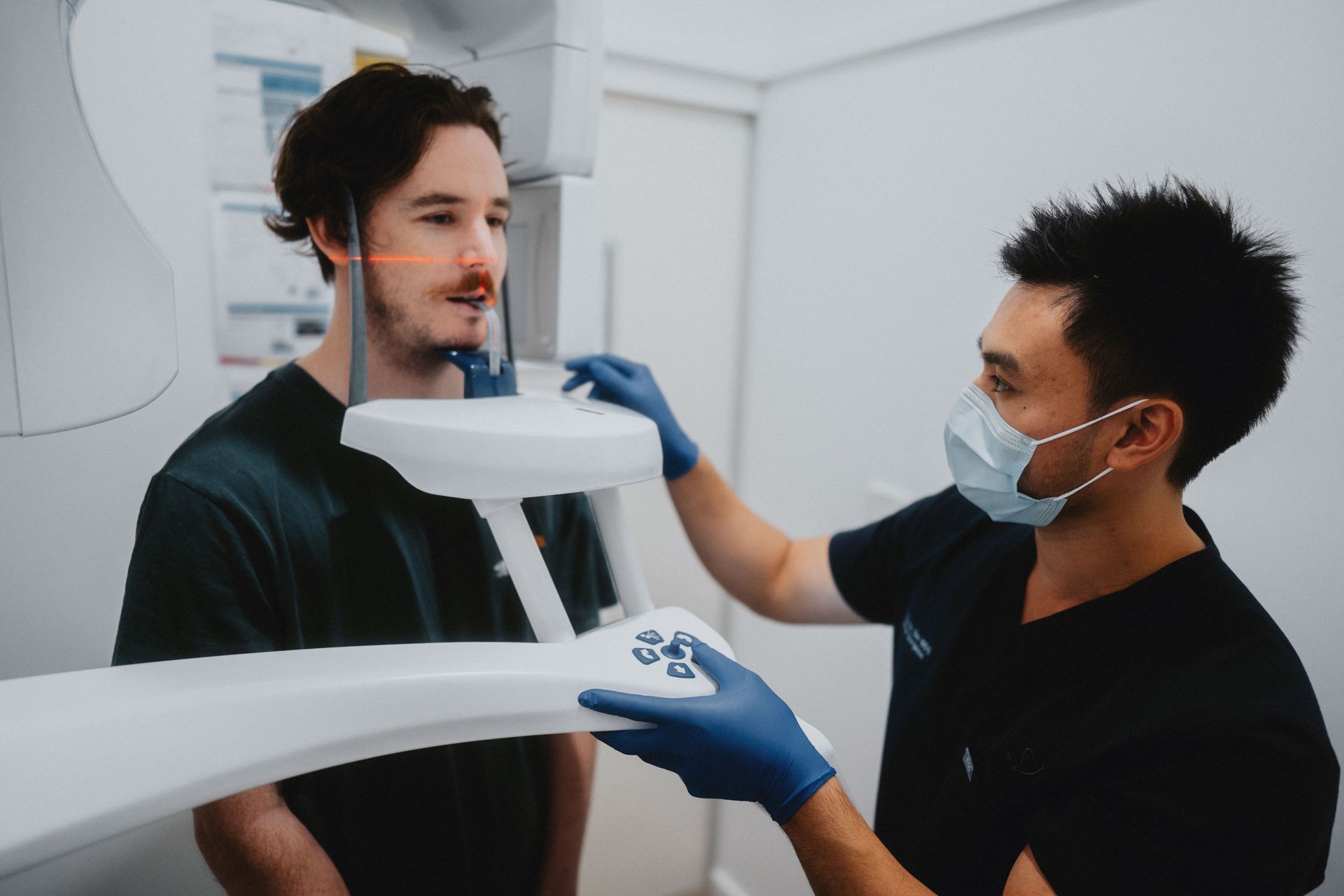 A Dental Professional Talks to a Patient — New Leaf Dentists In Erina, NSW